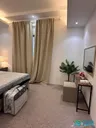 شقة جديدة مؤثثة في الخبر حي الحمراء بإطلالة على المدينة وموقف سيارات ومصعد كهربائي